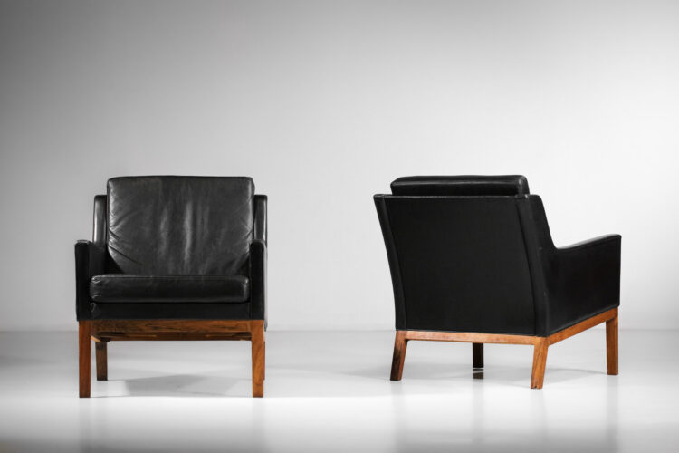 paire de fauteuil danois années 70 en cuir noir et palissandre de rio Kai Lyngfeldt Larsen - G123