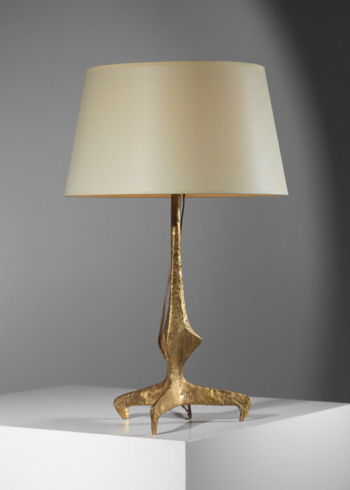 gilt bronze table lamp in the Felix Agostini style, tripod-shaped
