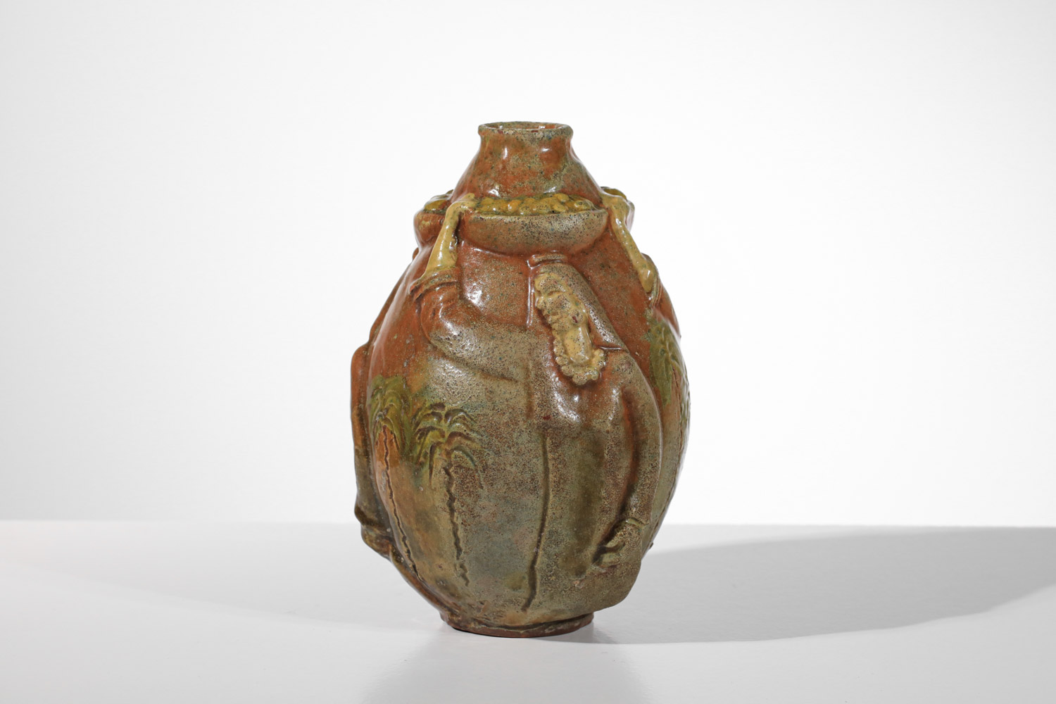 vase céramique Art déco à décors orientaliste massif bas-relief porteuse de fruits et palmiers style Paul Pouchol - J598 vase céramique Art déco à décors orientaliste massif bas-relief porteuse de fruits et palmiers style Paul Pouchol - J598